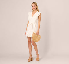 Sleeveless Ruffle Eyelet Mini Dress In Ivory