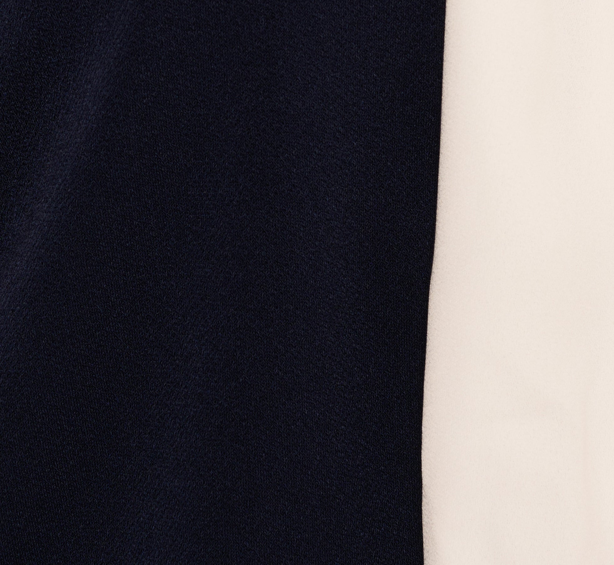 Flutter Sleeve Tie Neck Knit Top In Navy Ivory