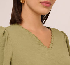 Short Sleeve Scalloped Eyelet Top In Oil Green
