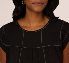 Extended Shoulder Contrast Stitch Yoke Top In Black Ivory