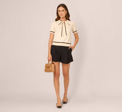 Short Sleeve Tie Neck Knit Top In Cream Black Camel
