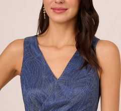 Metallic Mesh Faux Wrap Gown With Ruffle Accents In Light Navy